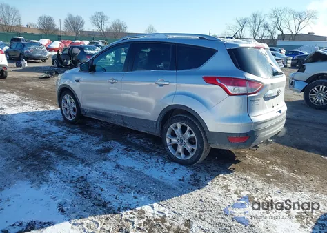 2015 Ford Escape Titanium z USA, uszkodzony, nr VIN 1FMCU9J96FUA02531